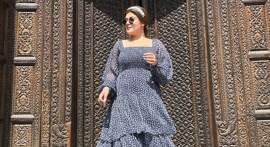 women in blue tiered maxi dress